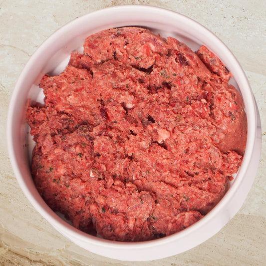 Albright’s Beef Complete and Balanced Raw Dog Food served in a bowl, sold by Benny’s Raw Dog Food