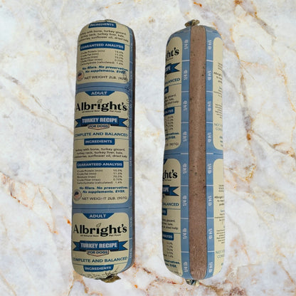 Albright’s Turkey Complete and Balanced Raw Dog Food 2 lb tube shown front and back, sold by Benny’s Raw Dog Food