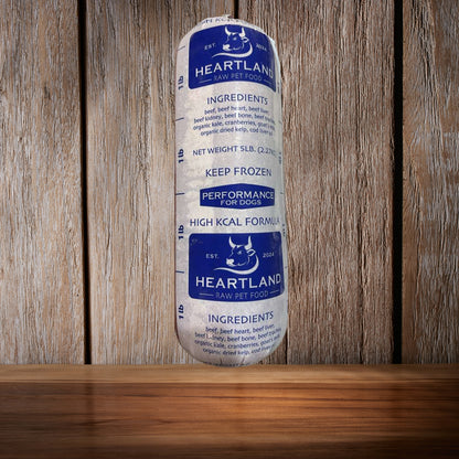 Heartland Raw Performance high calorie beef raw dog food tube package for dogs available at Benny’s Raw Dog Food